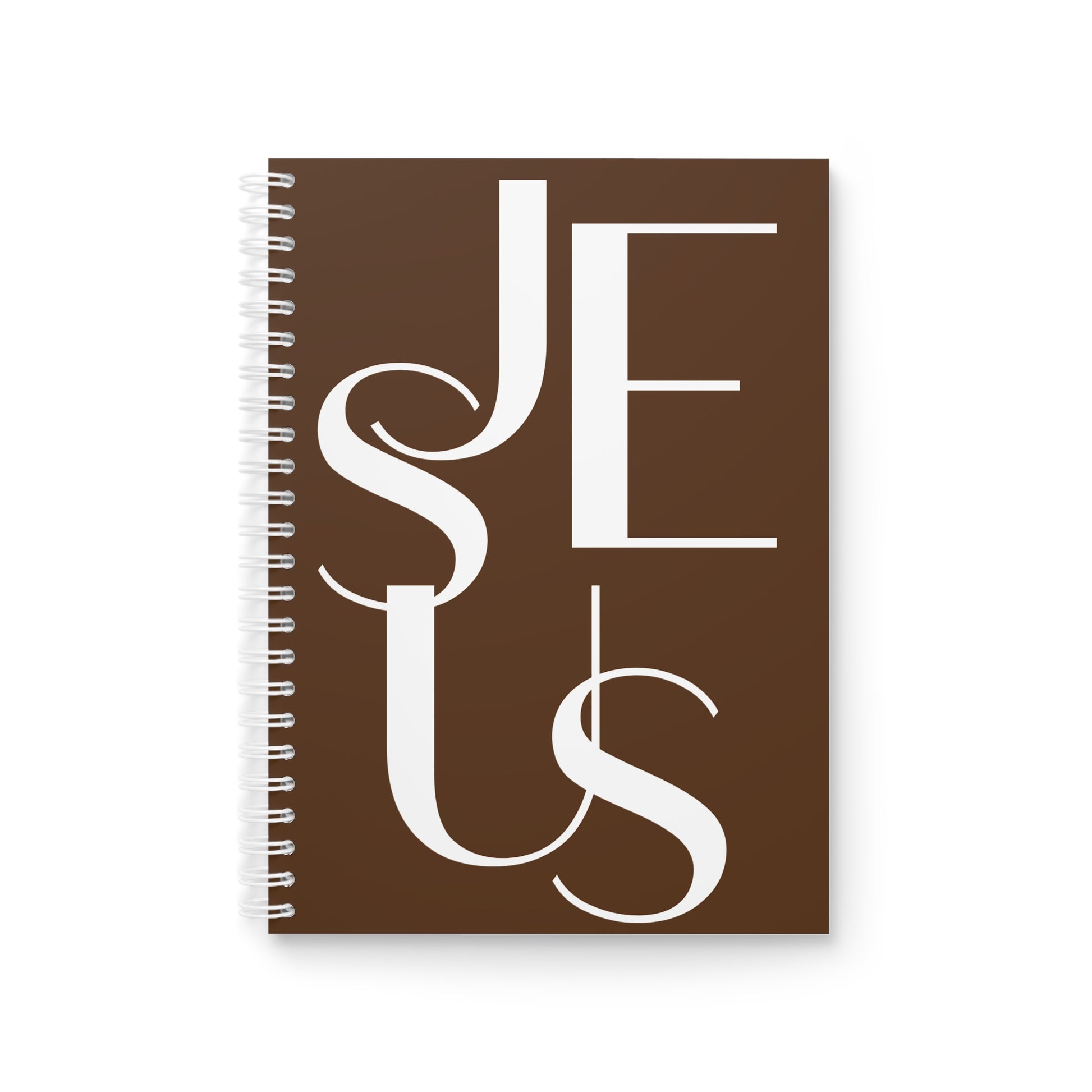 Carnet à spirales blanc avec le mot "JESUS" écrit en noir sur la couverture. Un article de papeterie chrétienne idéal pour la prise de notes et la méditation biblique.